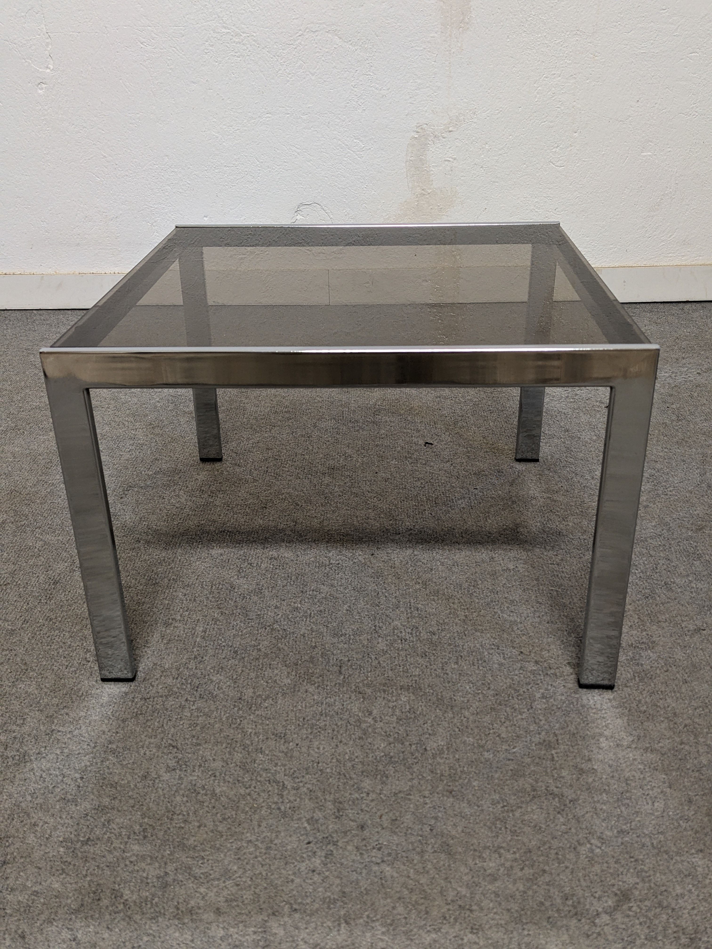 Bedside table or end of sofa in chromed metal and smoked glass from the 70s