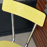 Pair of yellow formica chairs