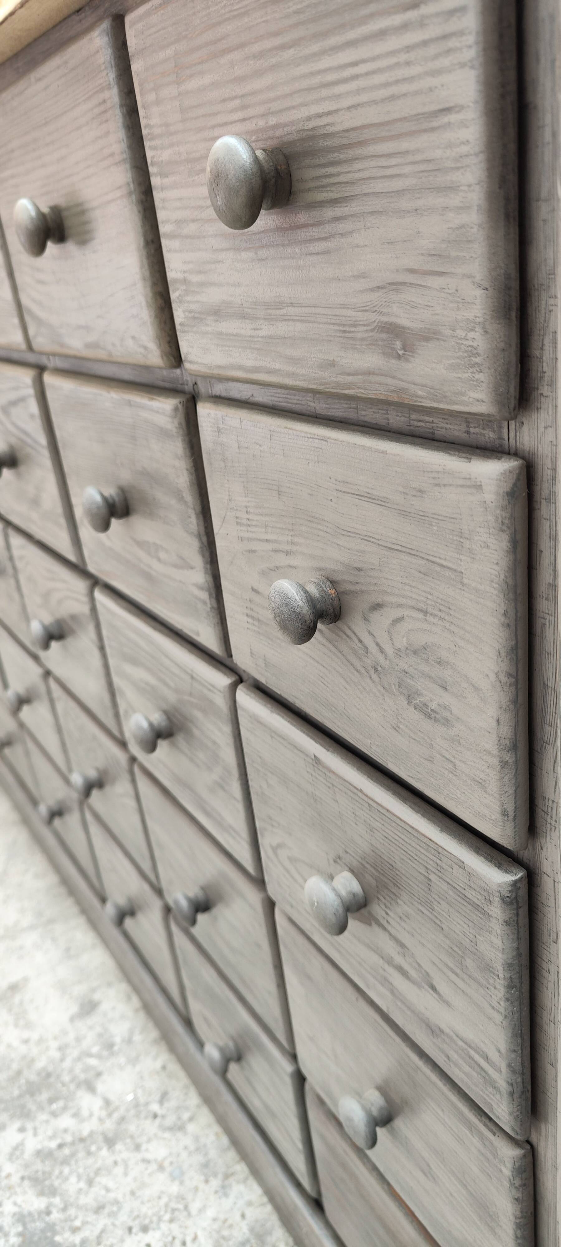 Old trade furniture with thirty drawers