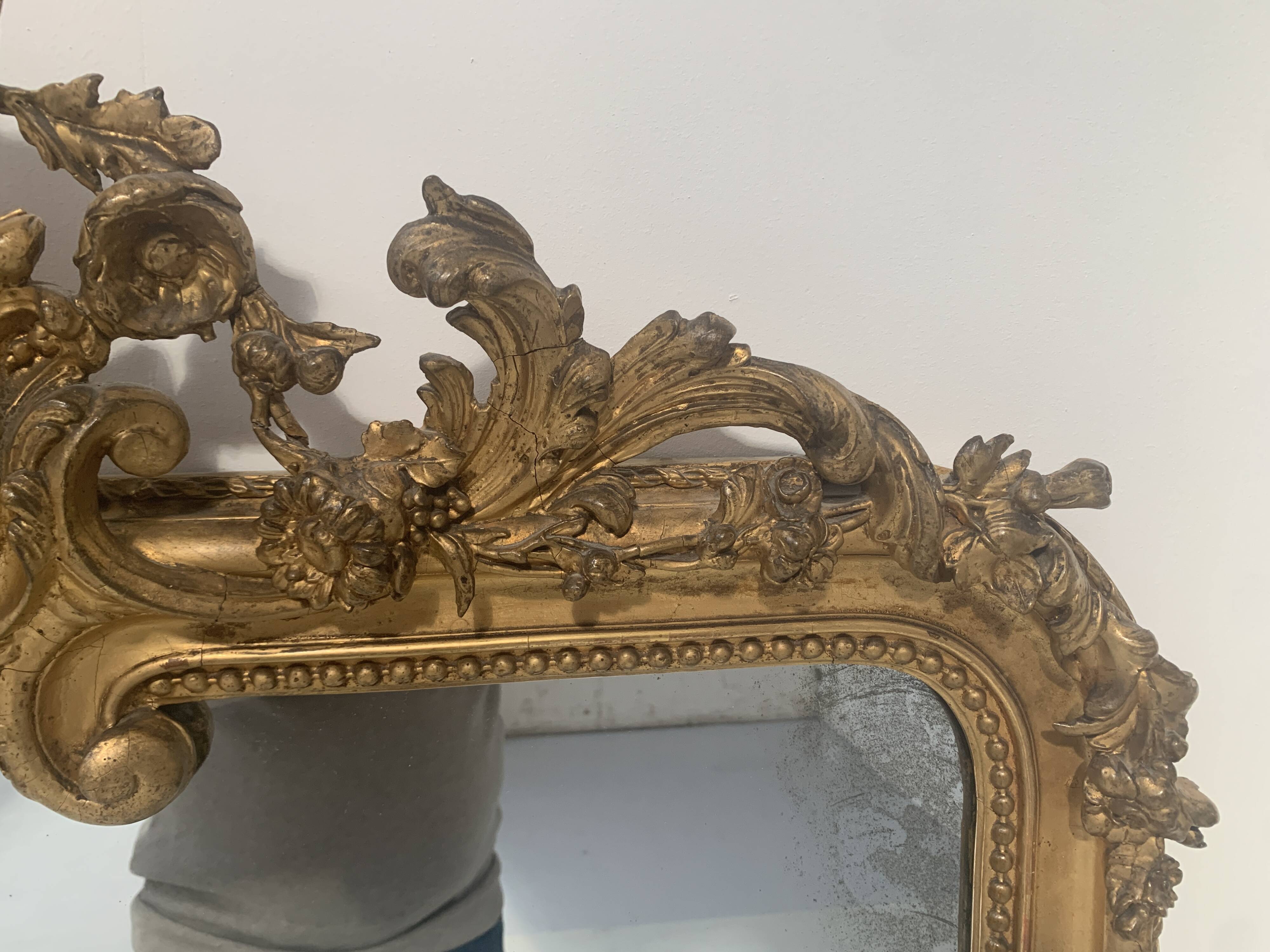 Louis XV style mirror in wood and gilded stucco, 19th century