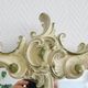 Florentine mirror in baroque style patinated in white and green