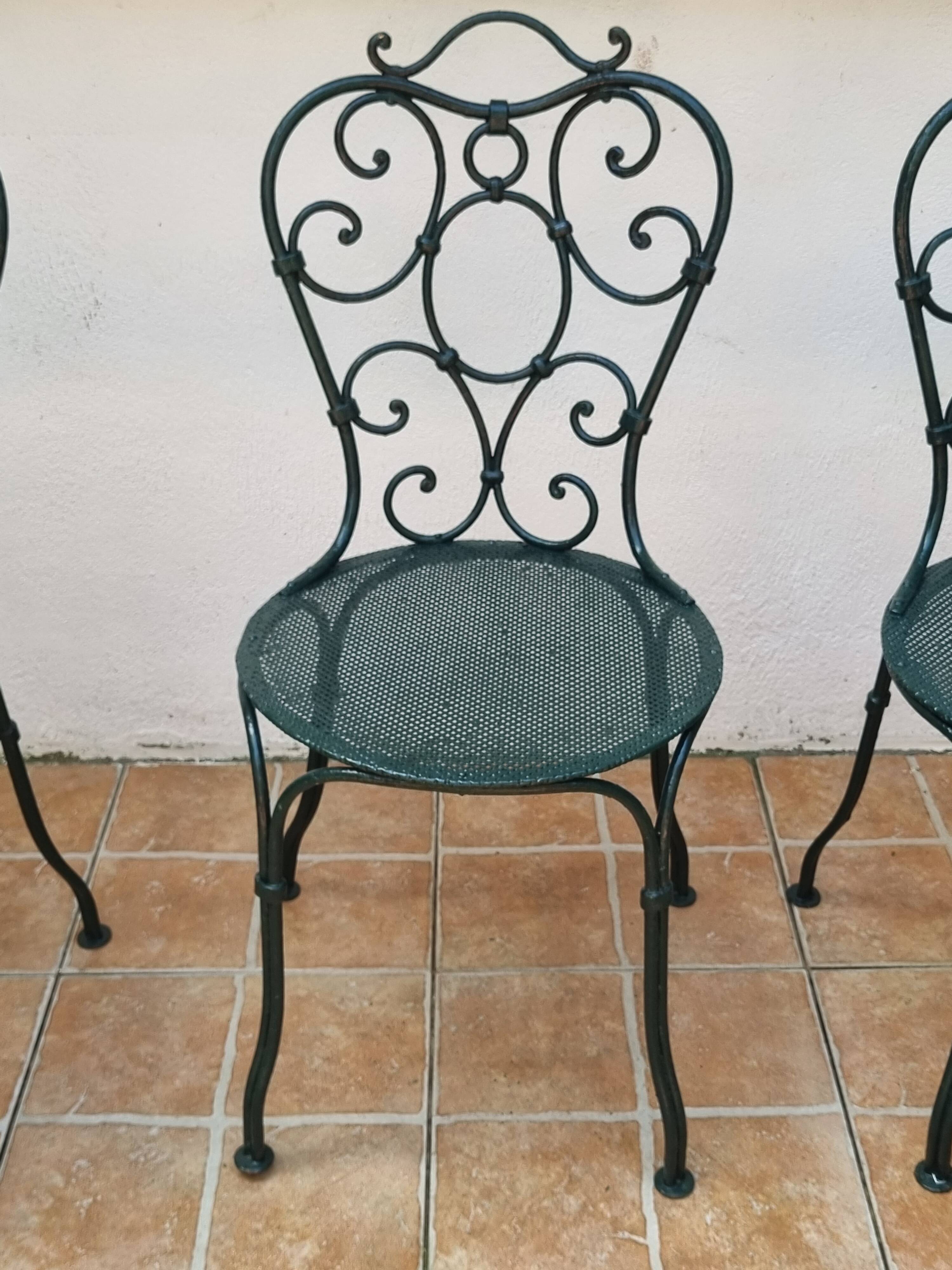 Set of 4 antique garden chairs in wrought iron from 1900.