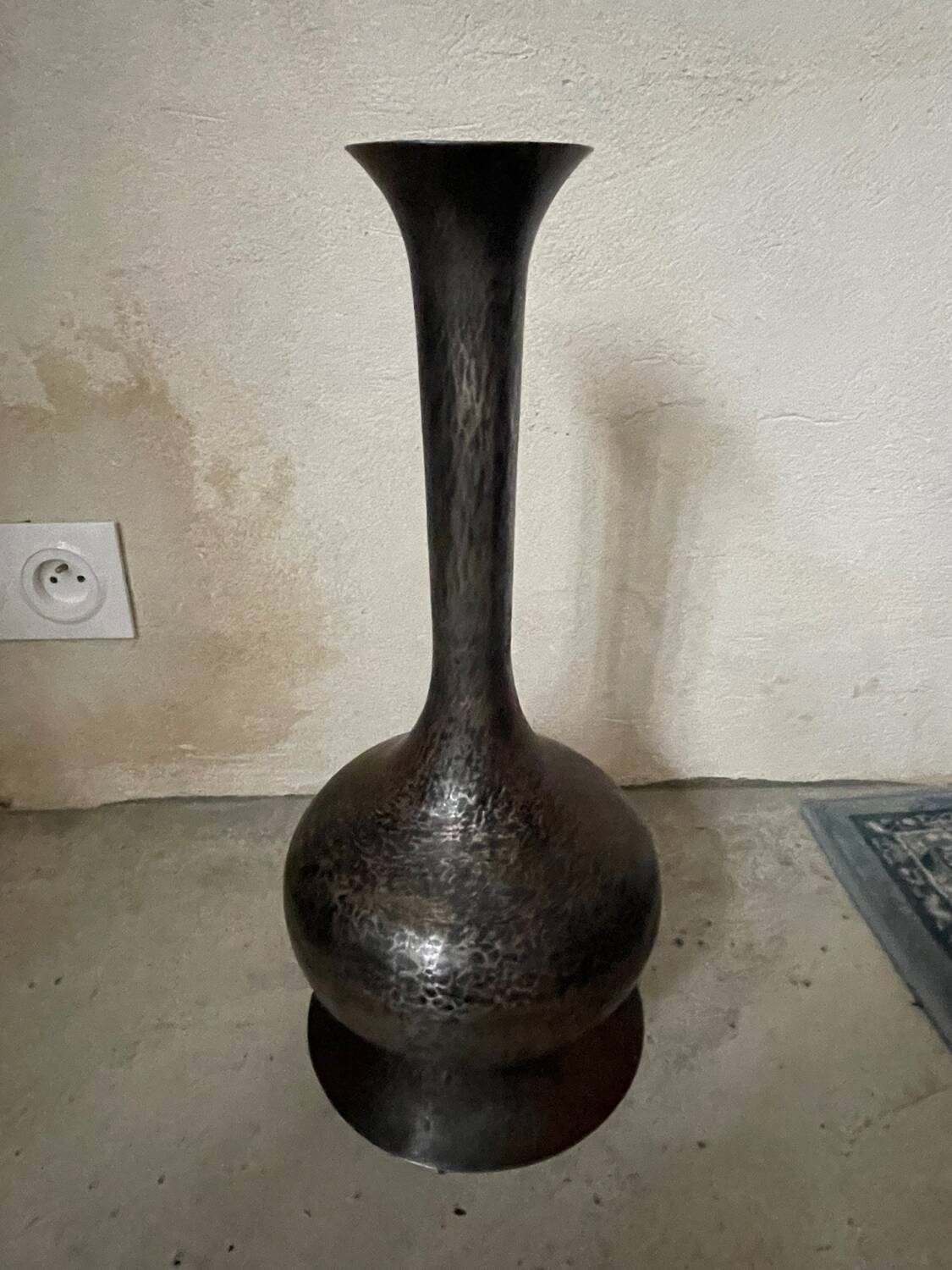 Hammered metal vase