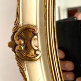 Mirror in wood and stucco with gilded highlights 20th century