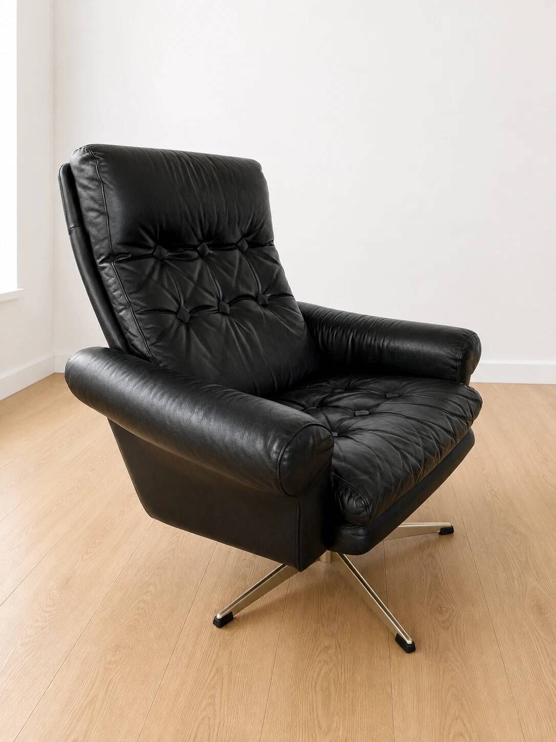 Vintage Danish mid-century black leather swivel chair 1970s