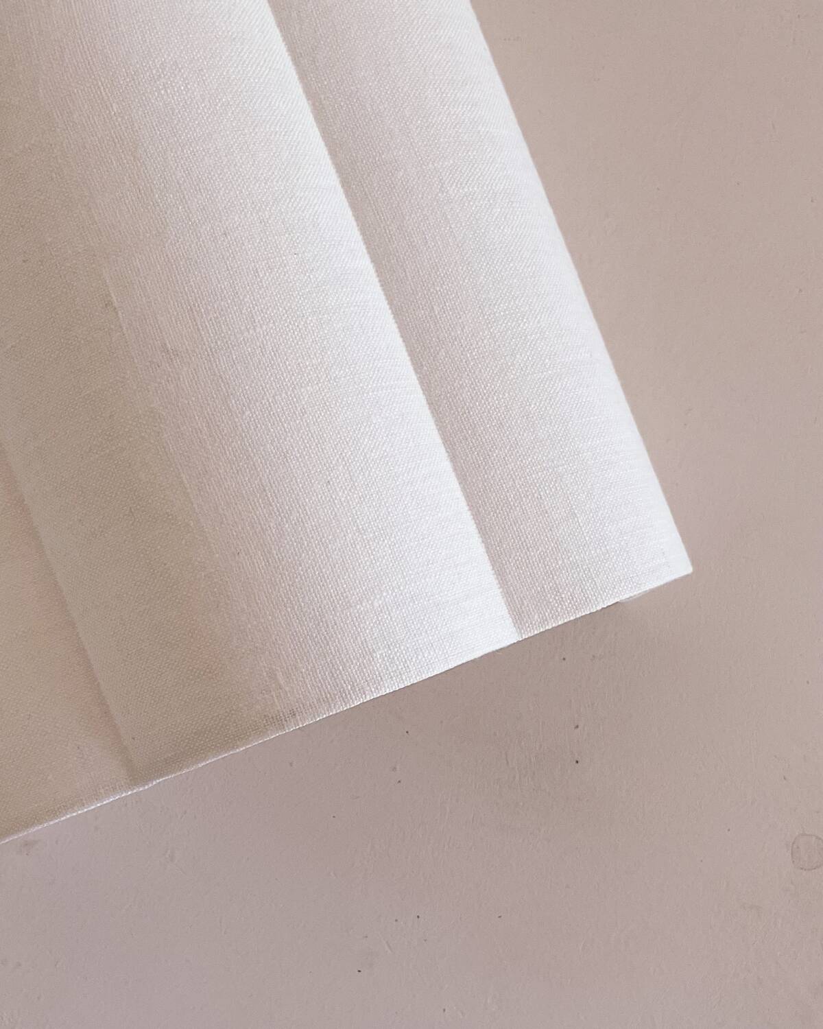 Pair of ecru linen wall lights