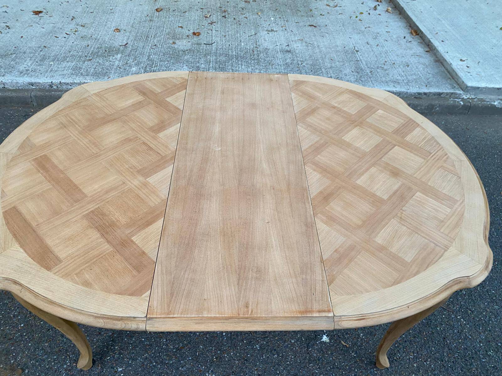 Round extendable dining table Louis XV stripped in solid cherry wood 1960