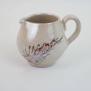 Pair of ceramic milk jugs signed La Roue Vallauris