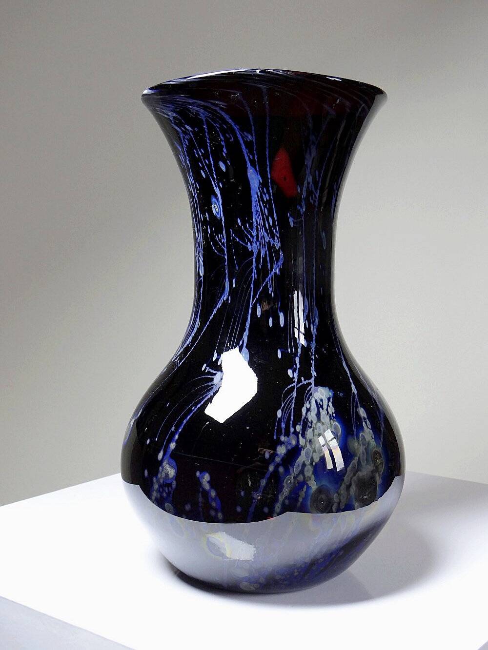 Large vintage purple art glass vase with silver glitter inclusions.