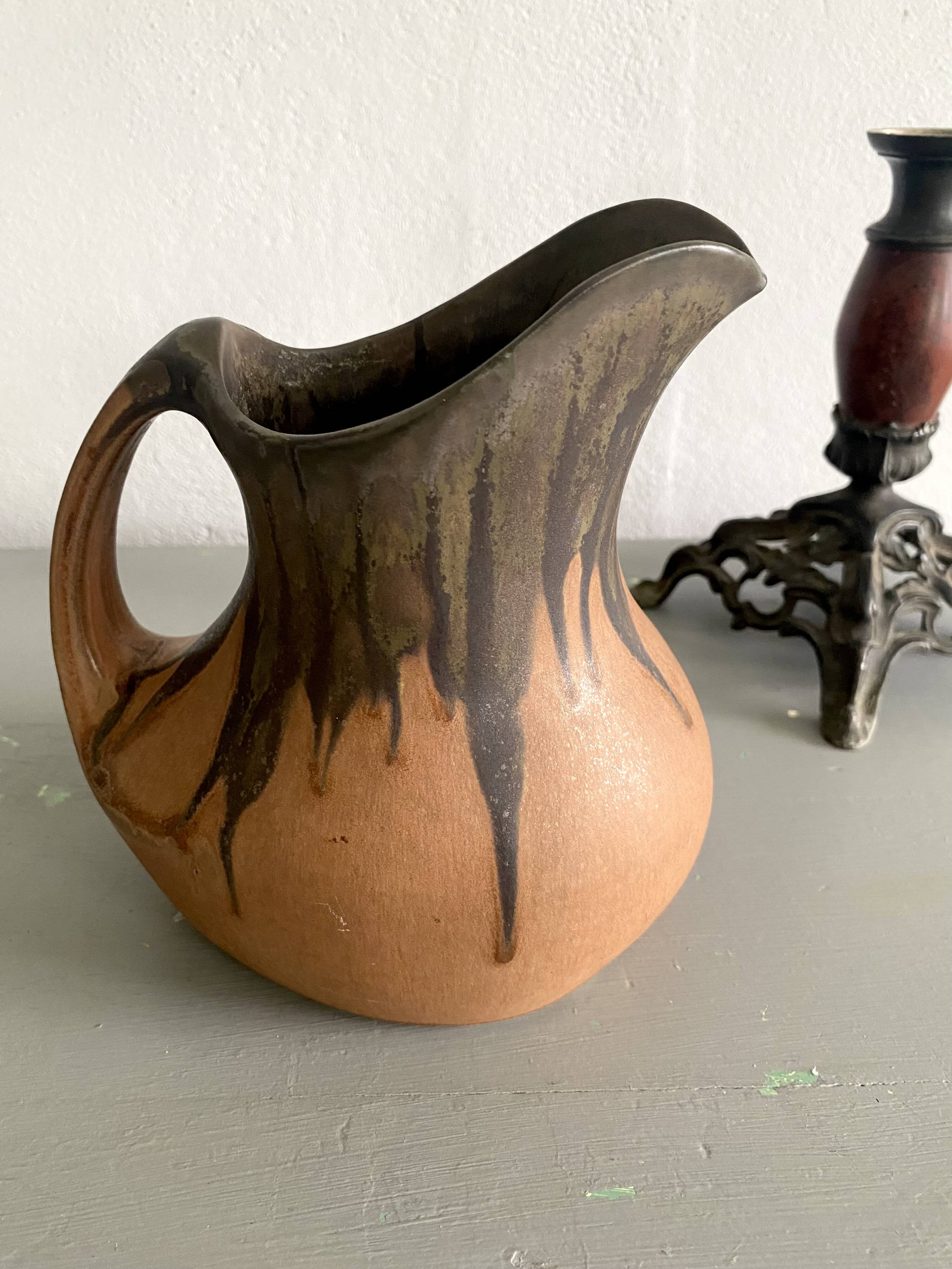 Denbac pitcher, flamed terracotta, 1900