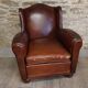 Fauteuil club ancien à oreilles