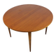 Table de repas ronde extensible en teck – années 60
