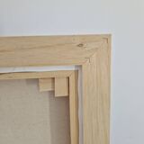 Framed monochrome blue abstract painting.