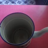 White enamelled sheet metal coffee maker with blue diamonds in relief