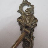 Pair of embraces in numerotée solid brass, rocaille style