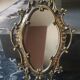 Antique gilded bronze wall mirror. Rococo/Baroque style. Dimensions 31x17cm.