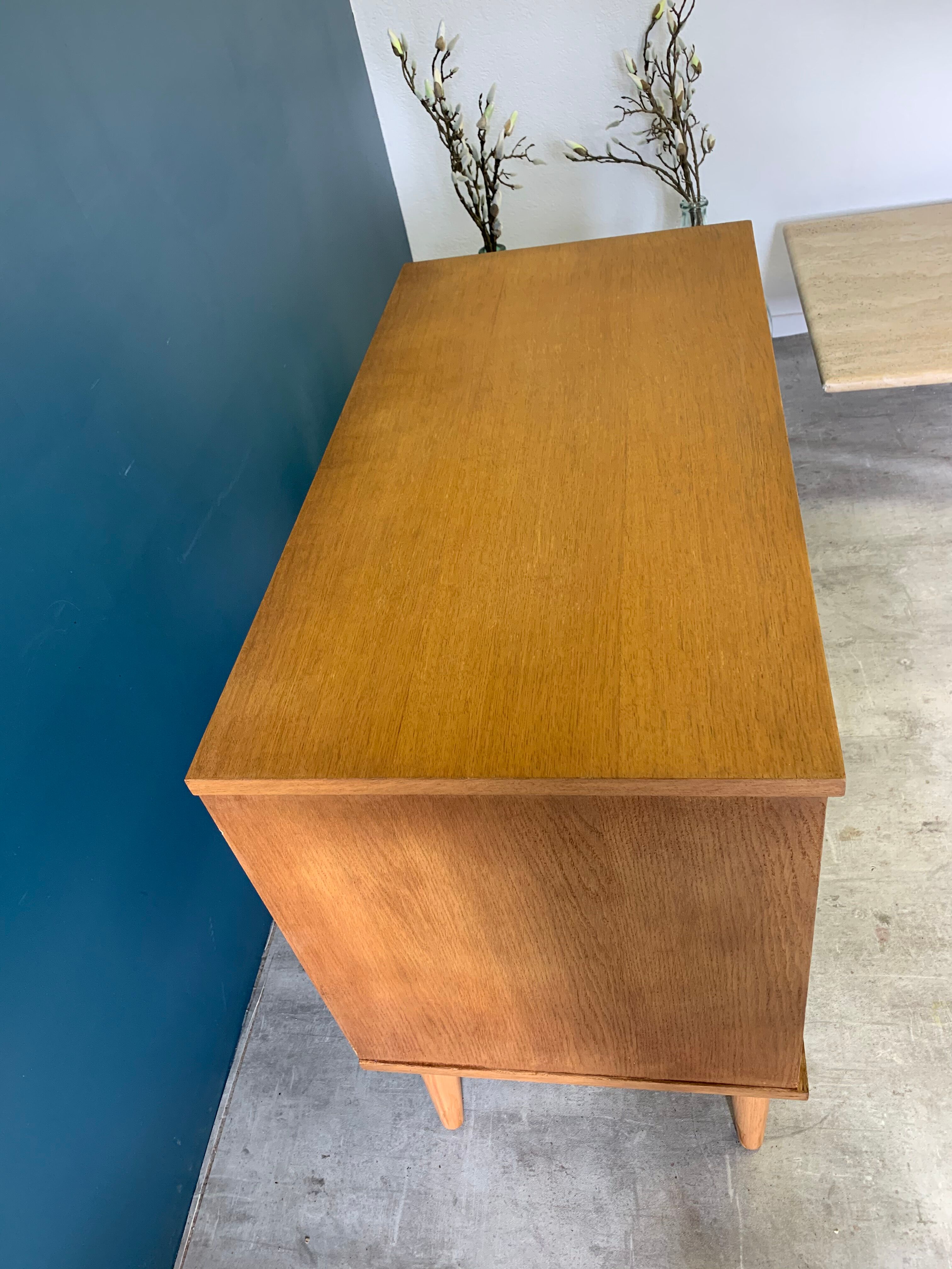Vintage chest of drawers with wing drawers