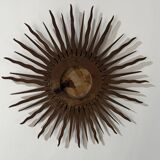 Sun Mirror called Witch's Mirror in gilded wood from the 20s