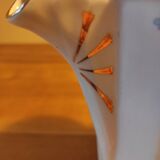 Coffee maker with floral decoration