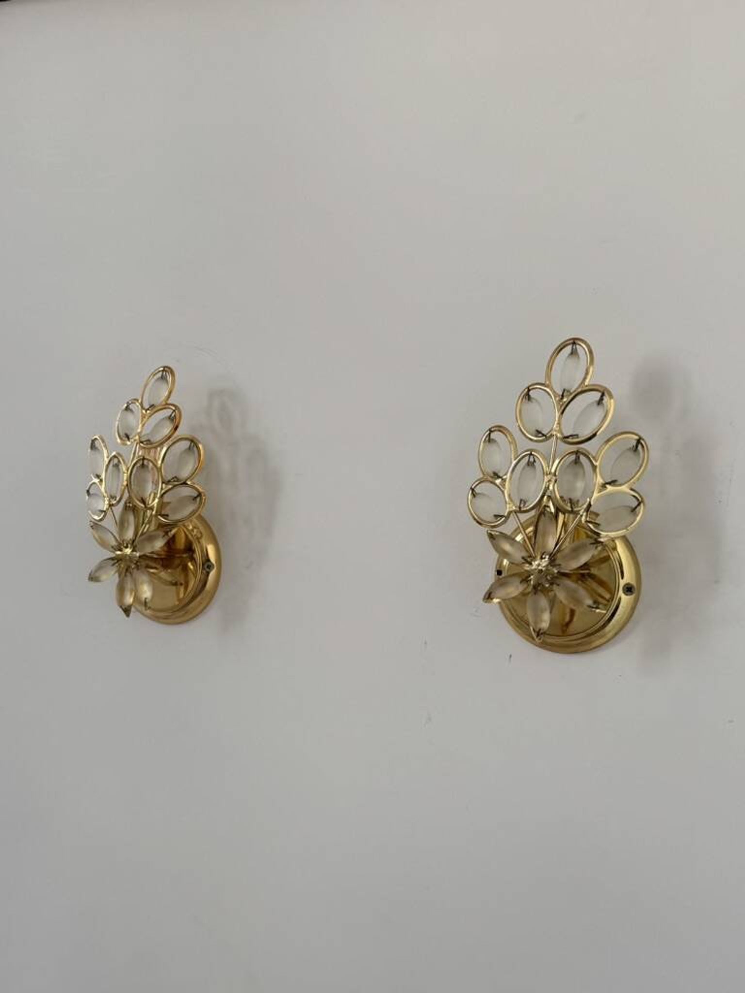 Pair of vintage brass wall lights with pendants, France, 1980.