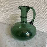 Carafe en verre verte forme bombée