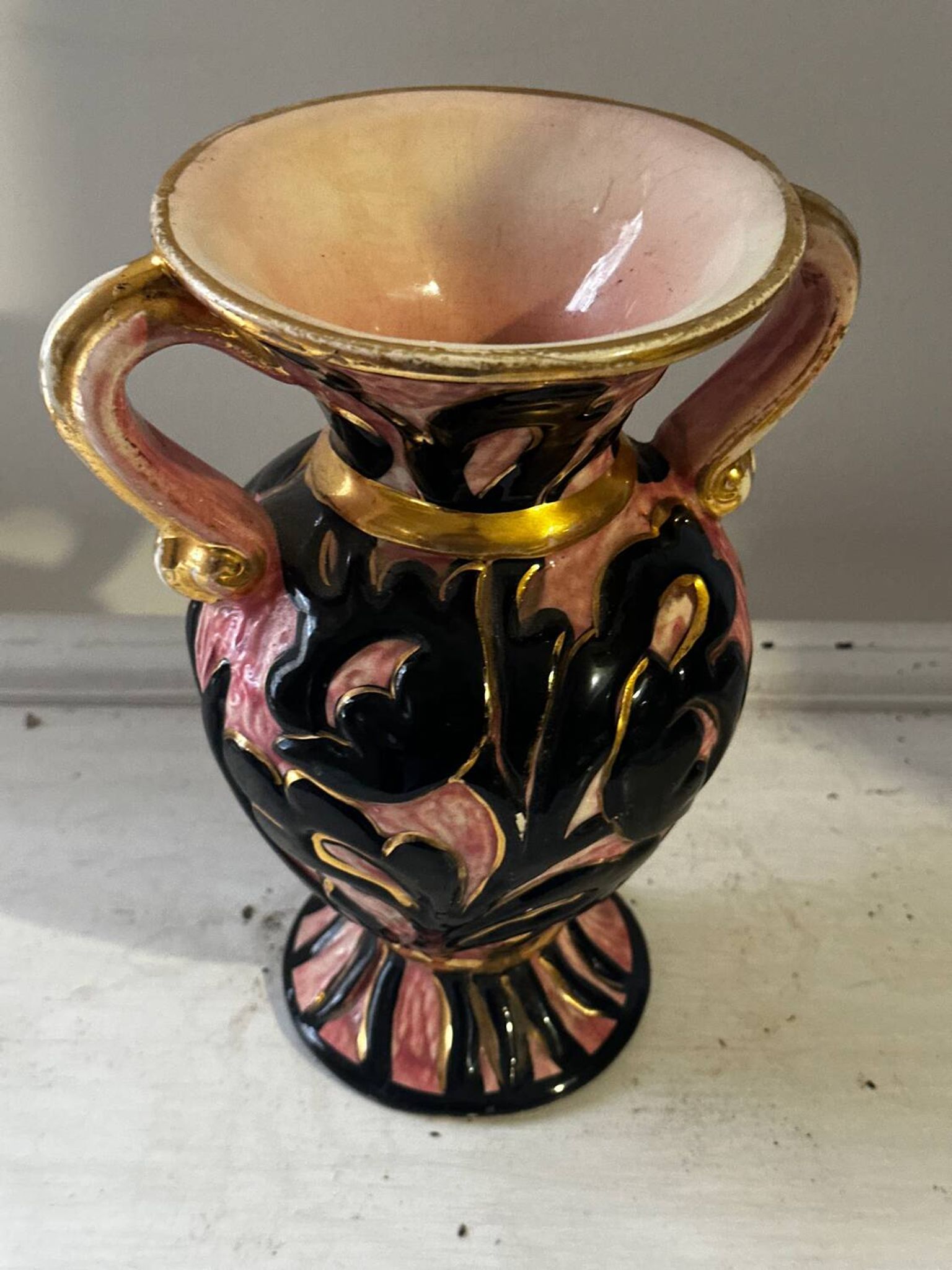 Vintage Vallauris vase amphora with relief floral decoration.