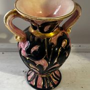 Vintage Vallauris vase amphora with relief floral decoration.