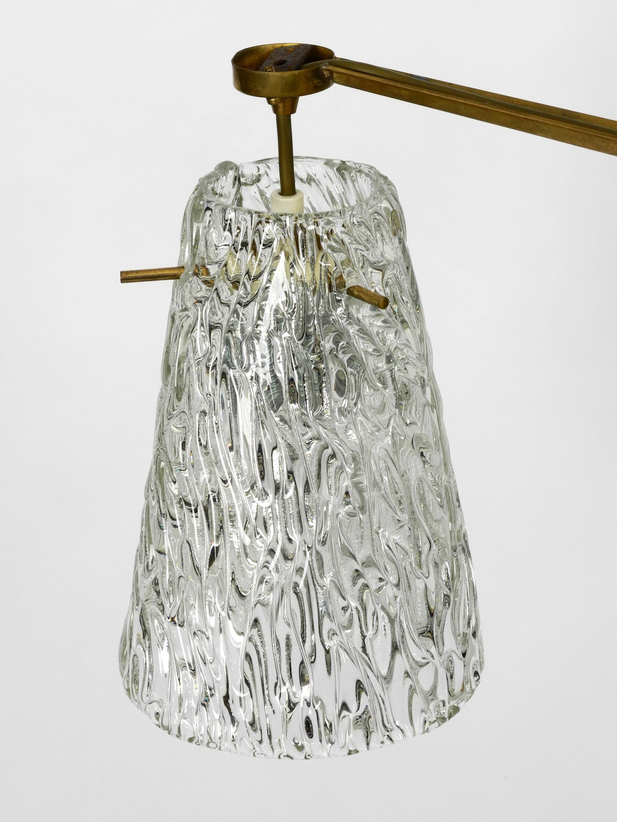 Heavy Mid Century ceiling lamp with three glass shades by Rupert Nikoll