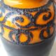 Vase en céramique orange et marron