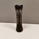 Crystal glass vase, in burgundy/reddish coloured glass with translucent details.