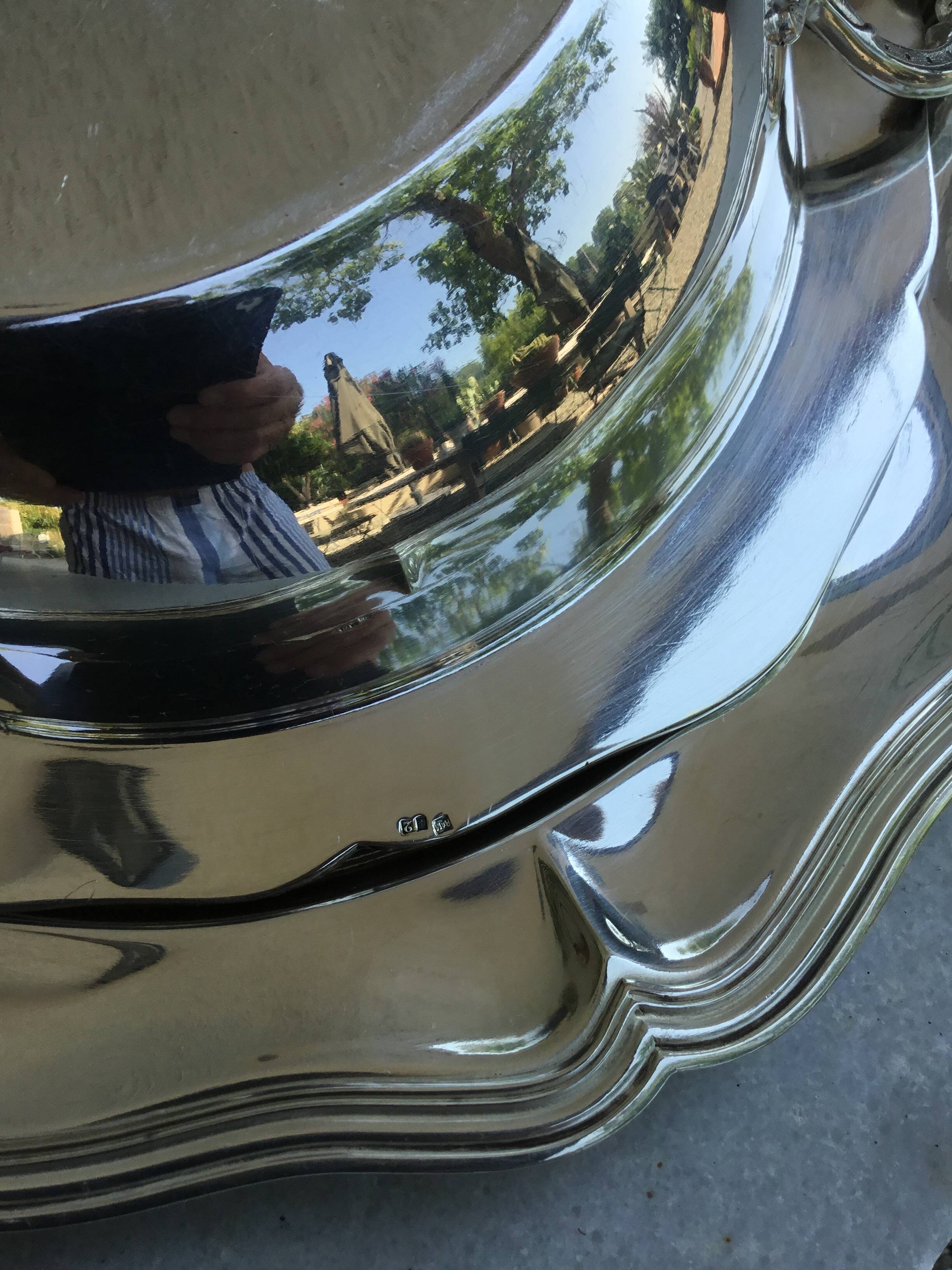 Important vegetable dish covered and its silver-plated metal stand in Louis XV style.