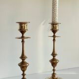 Pair of antique candle holders in solid brass