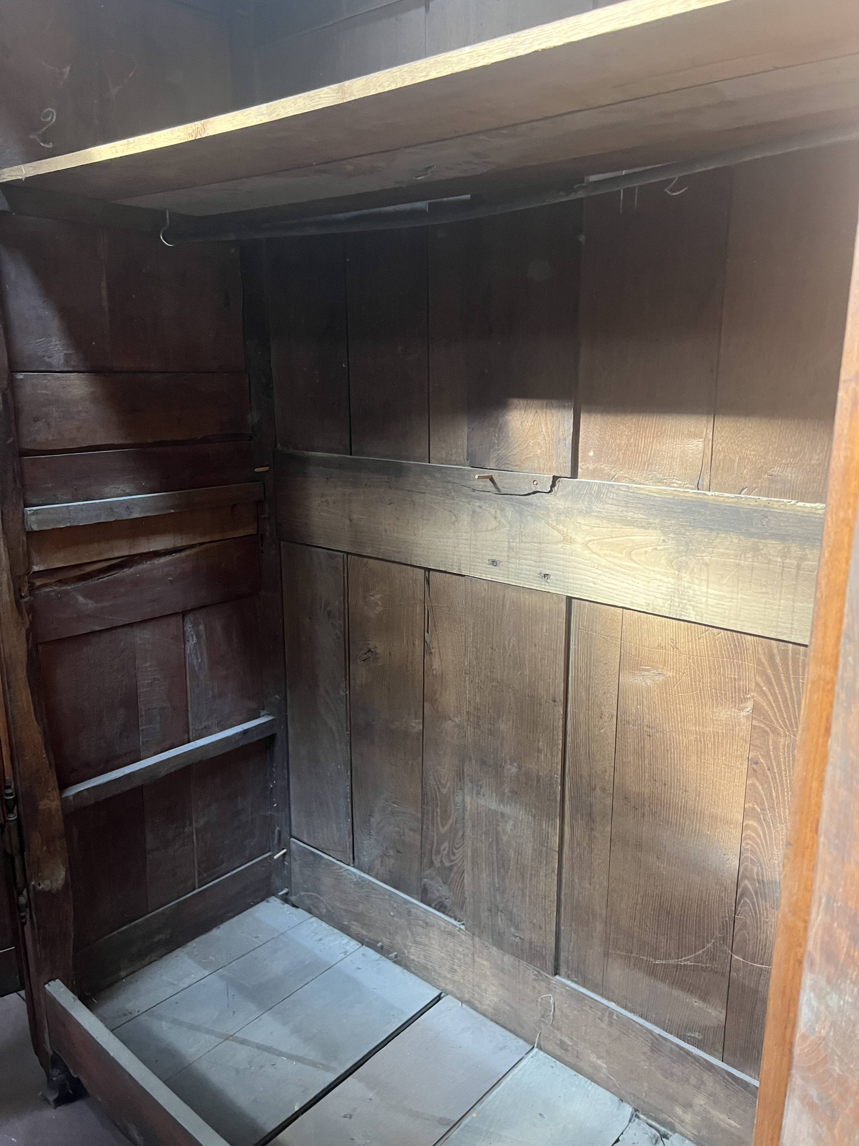 Louis XV armoire with gendarme's hat in solid cherry wood, 18th century