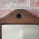 Wall-mounted coat rack mirror with solid wood hooks, brutalist mirror.