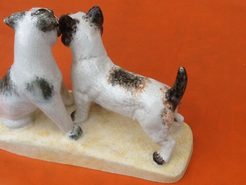Zoomorphic sculpture cracked ceramic fox terrier dogs