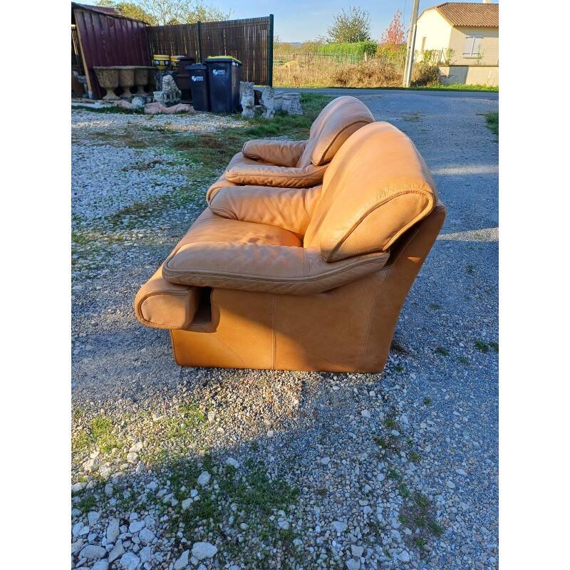 Paire de fauteuils vintage en skaï marron clair