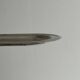 Small oval tray in shiny lightweight metal.