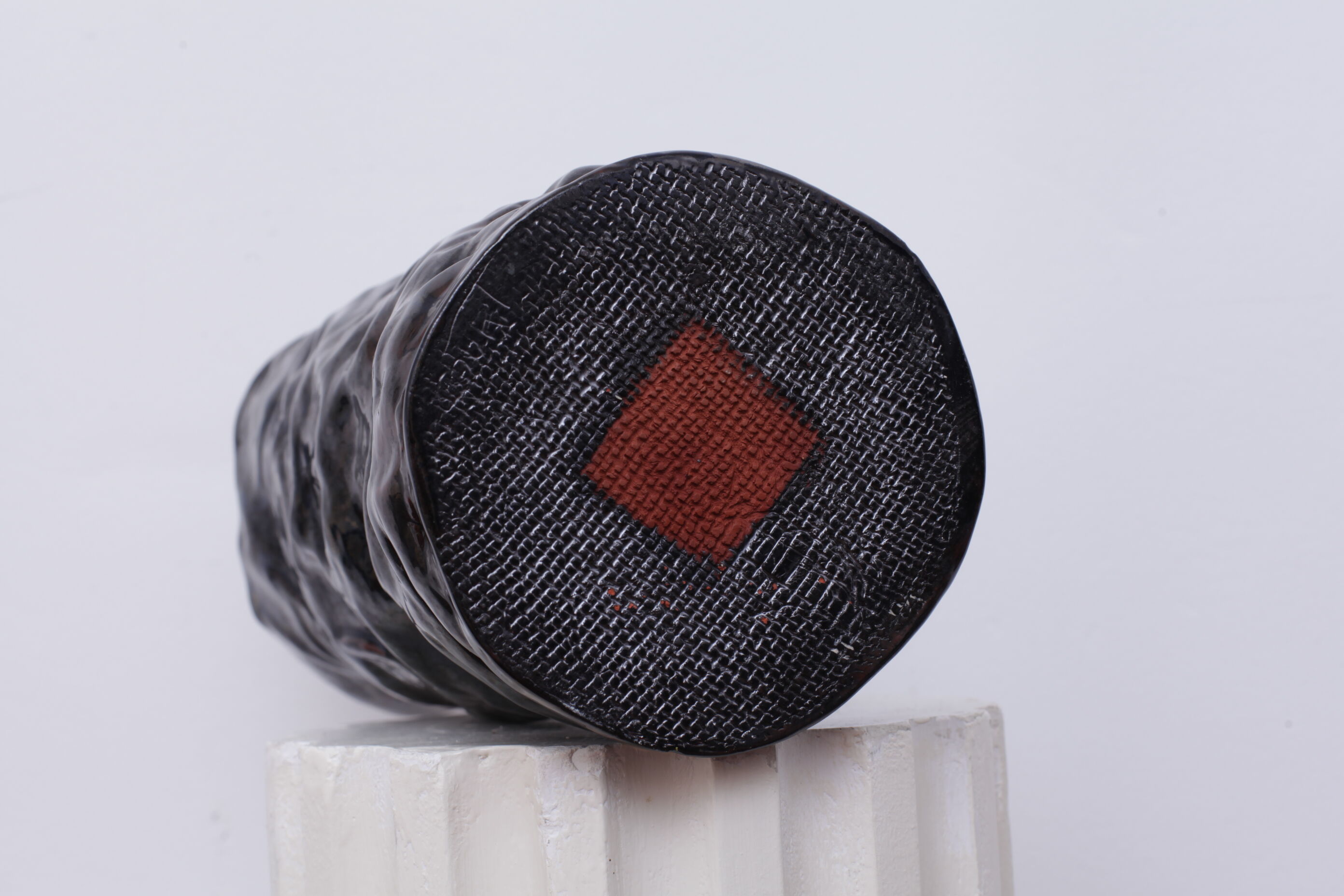 Thick black ceramic vase