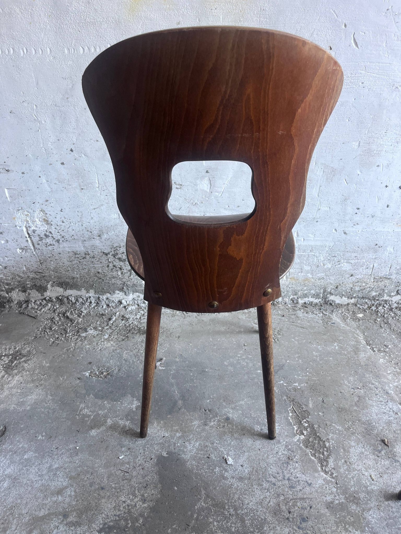 Set of six plywood dining chairs by Baumann, France, 1950s.