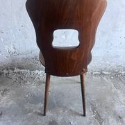 Set of six plywood dining chairs by Baumann, France, 1950s.