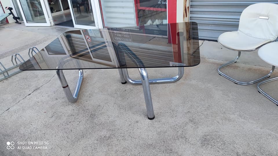 Table on top of glass and base in chromed metal around 1970 modular