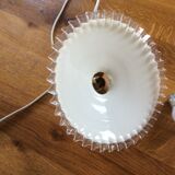 Old suspension in dented opaline