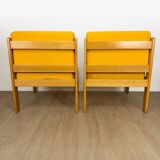 Pair of vintage Scandinavian armchairs in pine and fabric.