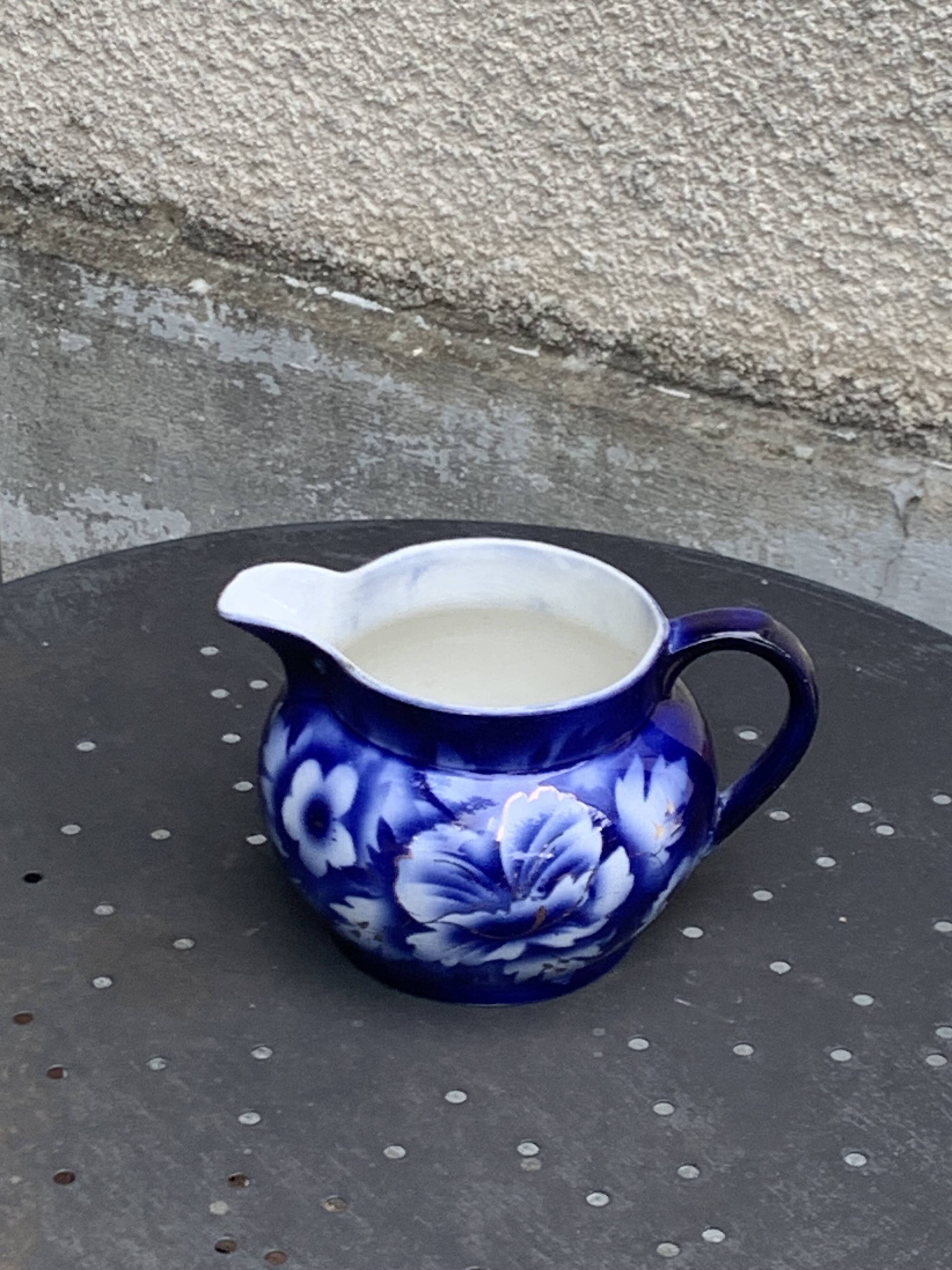 Milk jug with blue and gold peony pattern, made in England,