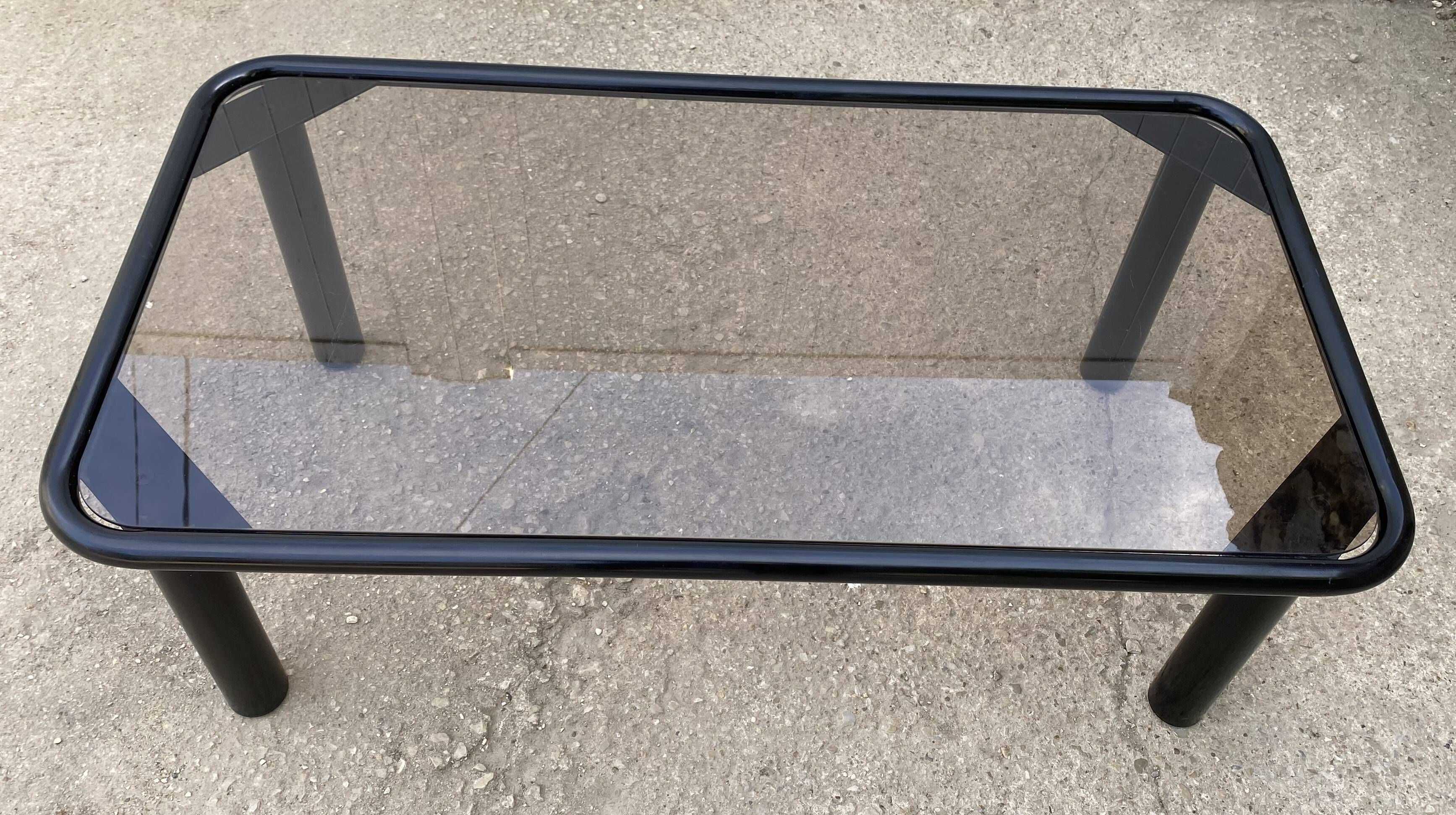 Black tubular coffee table with smoked glass by Yves Boutboul, 1980.