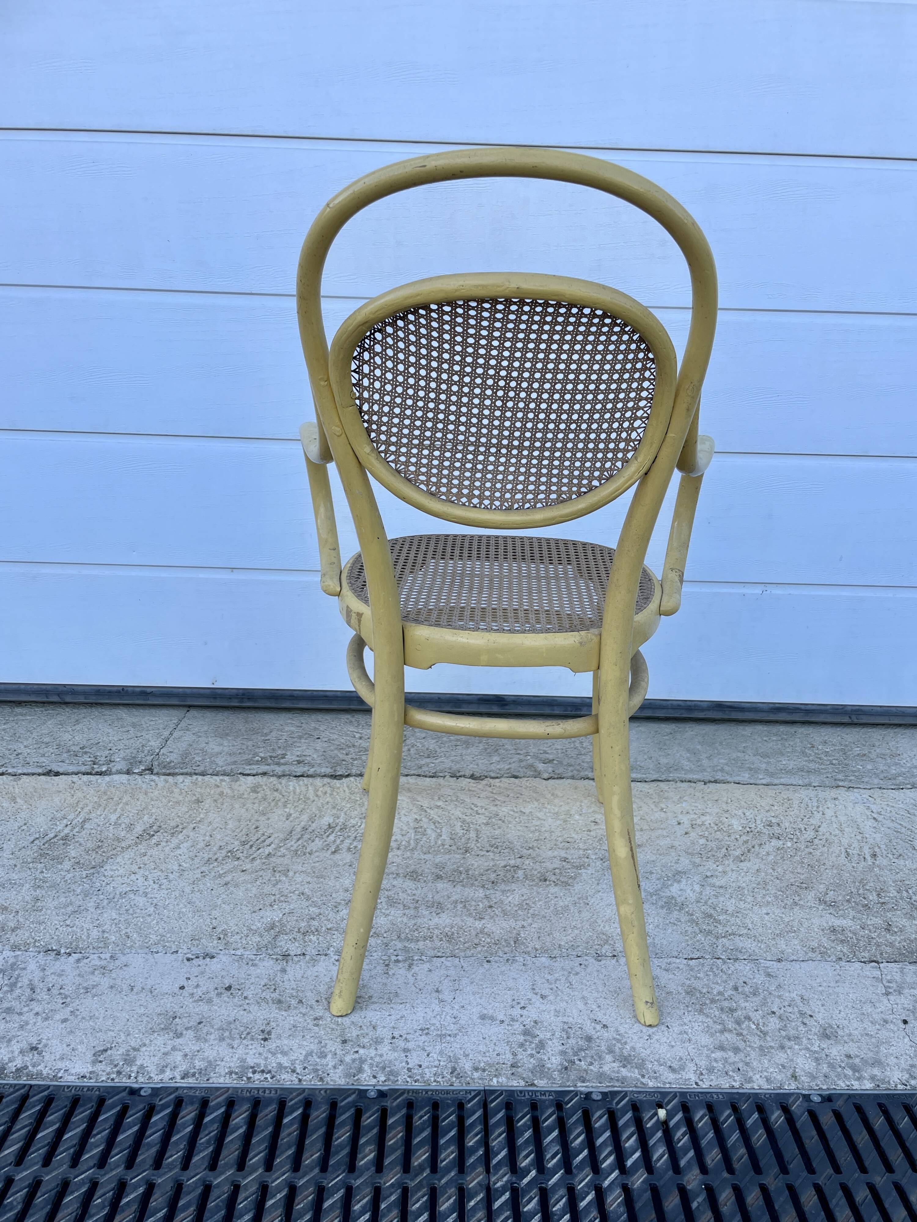 Old armchair Thonet canned wood