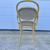 Old armchair Thonet canned wood