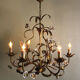 Golden metal chandelier with porcelain flowers, 50's