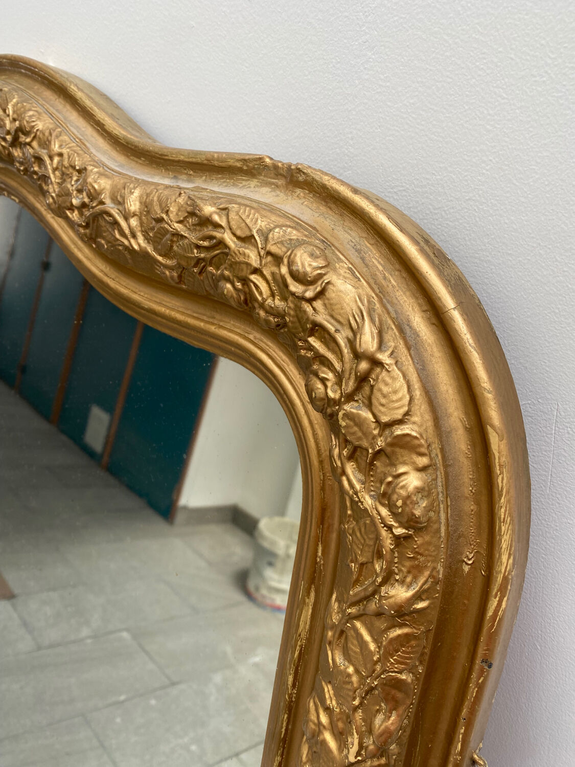 Large gilded patinated trumeau mirror