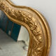 Large gilded patinated trumeau mirror